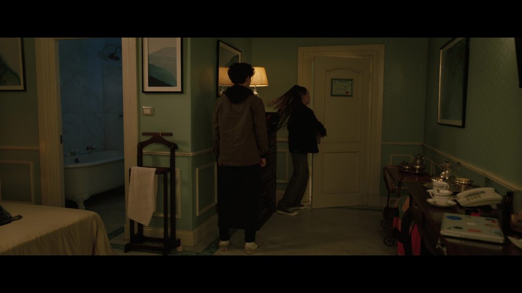 Vans Shoes and Apple MacBook Laptop in My Spy - The Eternal City (2024) (Image 1)