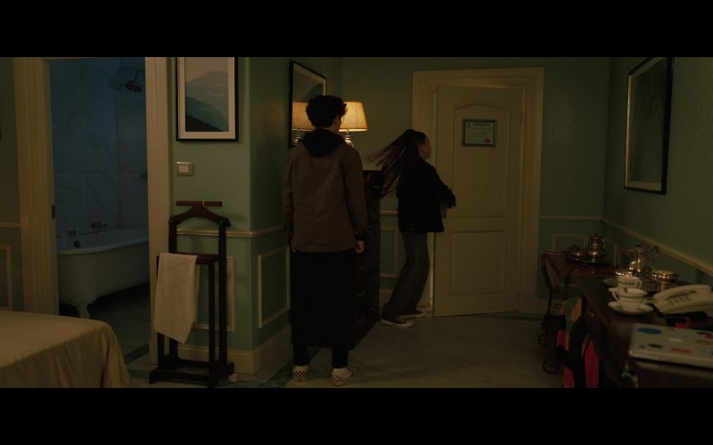 Vans Shoes and Apple MacBook Laptop in My Spy - The Eternal City (2024) (Image 1)