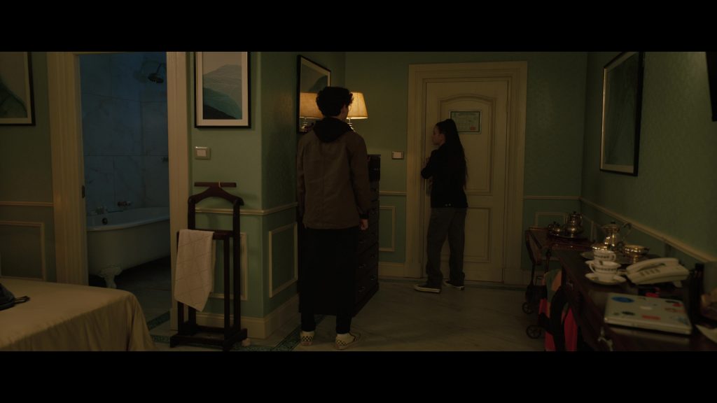 Vans Shoes and Apple MacBook Laptop in My Spy - The Eternal City (2024) (Image 2)