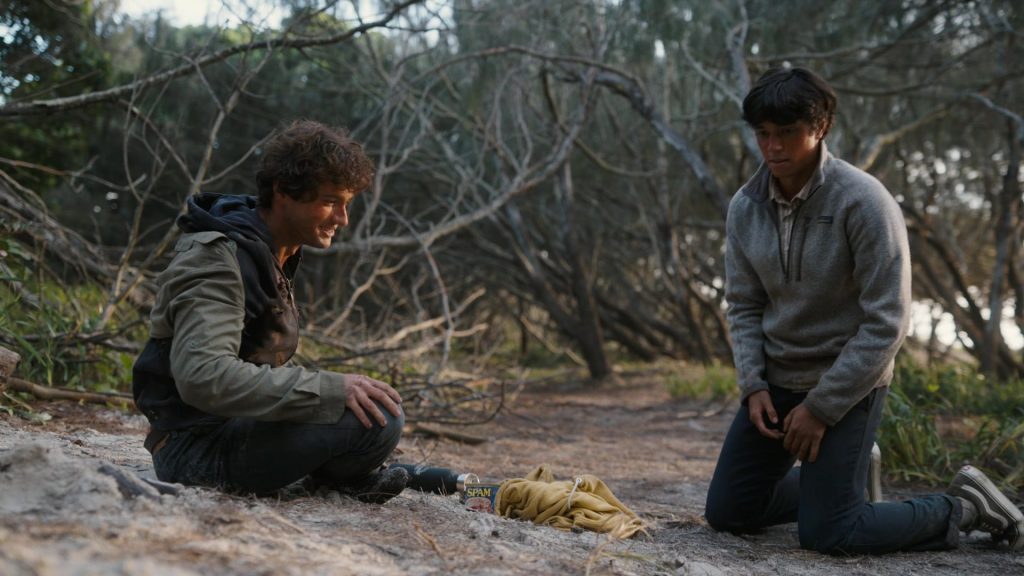Vans Shoes of Zack Calderon as Rafael Garcia and SPAM Canned Meat in The Wilds S02E06 “Day 46-26” (2022) (Image 1)