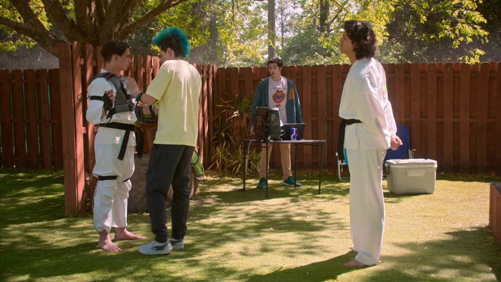 Vans Sneakers, Red Bull Energy Drinks, Coleman Cooler in Cobra Kai S06E12 “Rattled” (2025) (Image 2)