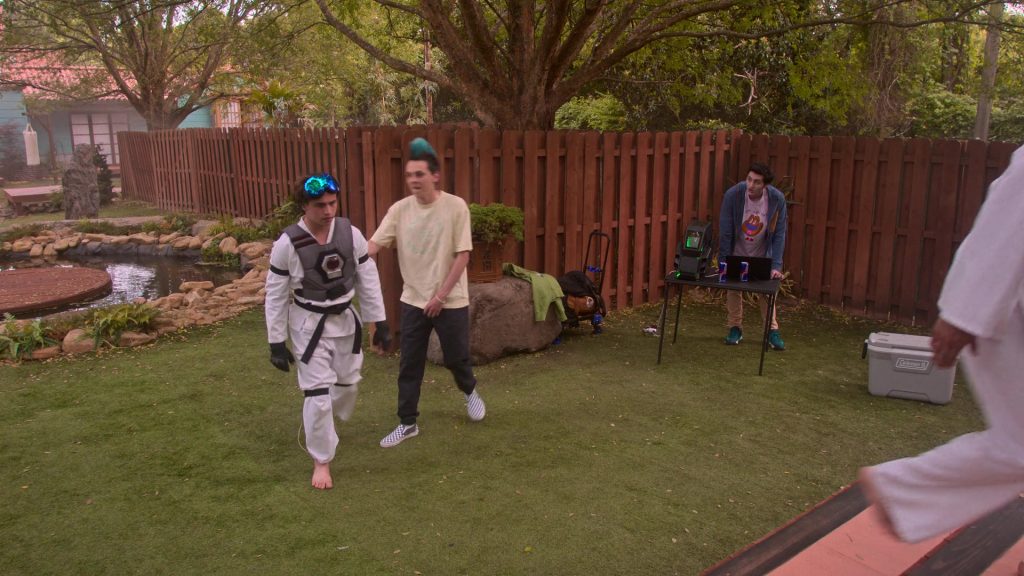 Vans Sneakers, Red Bull Energy Drinks, Coleman Cooler in Cobra Kai S06E12 “Rattled” (2025) (Image 4)