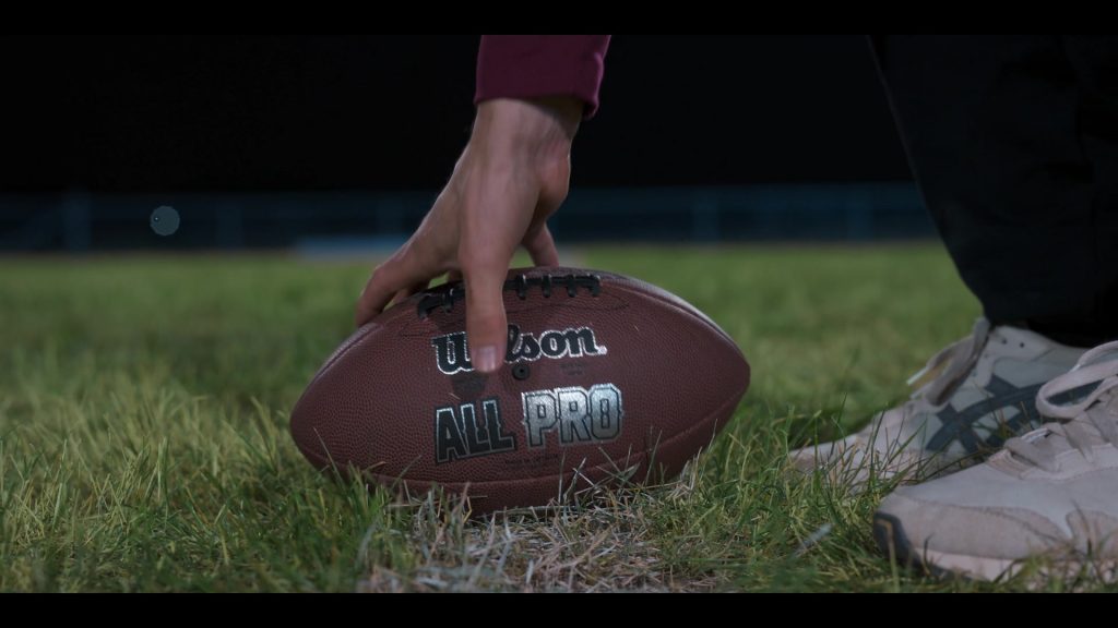 Wilson NFL Ball, Asics Shoes in My Life with the Walter Boys S02E04 “No-look Pass” (2025) (Image 2)